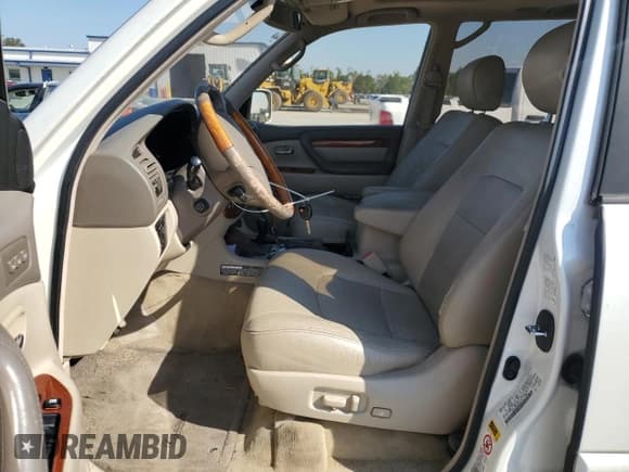 ✅ 2003 Lexus LX 470 • VIN: JTJHT00W533535145 • Lot: 75691714. Wystawiony na Copart z przebiegiem 139 238 mil. Bezpłatny archiwum sprzedaży aukcyjnych z USA i szczegółowy raport historii pojazdu na DreamBid. Zdjęcie 7.