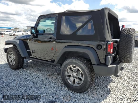 ✅ 2016 Jeep Wrangler Rubicon • VIN: 1C4BJWCG1GL197383 • Lot: 87363325. Listed on Copart with 44,223 mi. Free auction sales archive from the USA and detailed vehicle history report at DreamBid. Image 2.