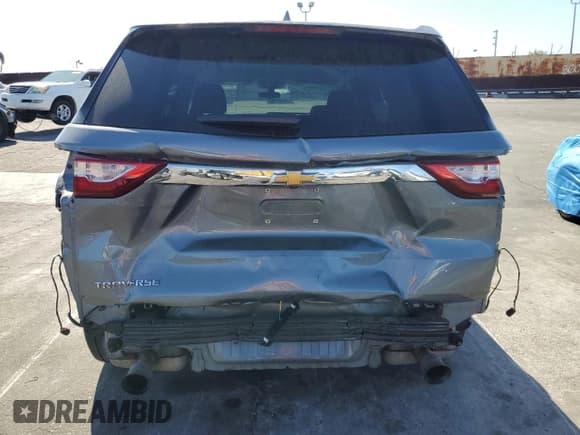 ✅ 2021 Chevrolet Traverse LS • VIN: 1GNERFKW3MJ166150 • Lot: 82398425. Wystawiony na Copart z przebiegiem 145 591 mil. Bezpłatny archiwum sprzedaży aukcyjnych z USA i szczegółowy raport historii pojazdu na DreamBid. Zdjęcie 6.