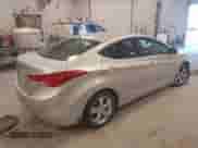 2013 Hyundai Elantra Limited z VIN KMHDH4AE1DU009702, wystawiony jako IAAI lot #43317233 z przebiegiem 211 882 mil mil oraz . Historia ofert i sprzedaży dostępna na DreamBid. Obrazek 4.