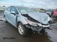 ✅ 2018 Chevrolet Cruze LT • VIN: 1G1BE5SM3J7101896 • Lot: 34337922. Listed on Copart with 52,303 mi. Free auction sales archive from the USA and detailed vehicle history report at DreamBid. Image 1.