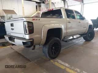 2016 Chevrolet Silverado 1500 LT z VIN 3GCUKREC1GG349127, wystawiony jako IAAI lot #42820991 z przebiegiem 133 776 mil mil oraz . Historia ofert i sprzedaży dostępna na DreamBid. Obrazek 4.