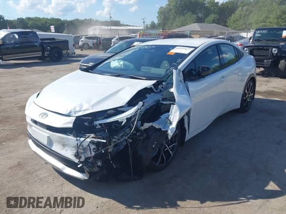 2025 Toyota Prius SE with VIN JTDACACU9S3047156, listed as a IAAI auction lot 43135827 with 2,433 mi miles and . Bid and sale history available at DreamBid. Image 6.