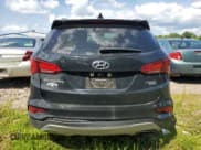 ✅ 2017 Hyundai Santa Fe 2.4L • VIN: 5NMZUDLB0HH020910 • Лот: 68300154. Опубликован ранее на Copart с пробегом 119 979 миль. Бесплатный доступ к архиву аукционных продаж из США и подробный отчёт об истории автомобиля на DreamBid. Изображение 6.