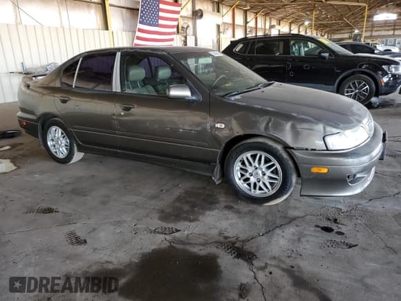 ✅ 2001 Infiniti G20 Luxury • VIN: JNKCP11A11T403098 • Lot: 53855605. Listed on Copart with 187,656 mi. Free auction sales archive from the USA and detailed vehicle history report at DreamBid. Image 4.