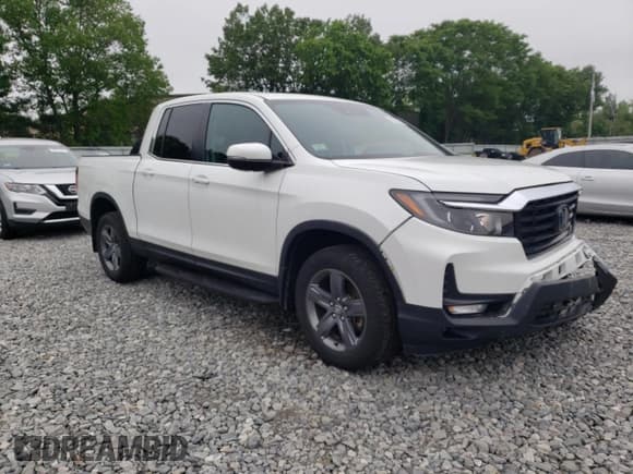 ✅ 2022 Honda Ridgeline RTL • VIN: 5FPYK3F57NB001597 • Lot: 60258535. Listed on Copart with 8,542 mi. Free auction sales archive from the USA and detailed vehicle history report at DreamBid. Image 4.