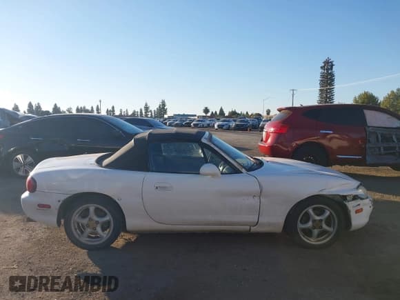 ✅ 1999 Mazda MX-5 Miata • VIN: JM1NB3535X0103235 • Lot: 43538556. Listed on IAAI with 238,235 mi. Free auction sales archive from the USA and detailed vehicle history report at DreamBid. Image 13.