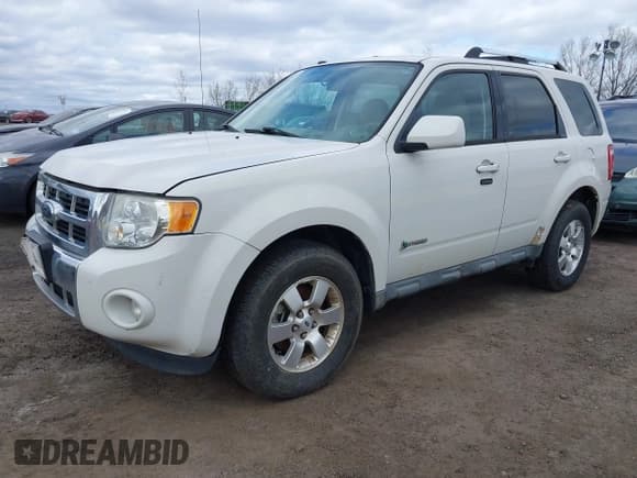 ✅ 2009 Ford Escape Hybrid • VIN: 1FMCU49379KD08964 • Lot: 42064656. Listed on IAAI with 133,536 mi. Free auction sales archive from the USA and detailed vehicle history report at DreamBid. Image 2.