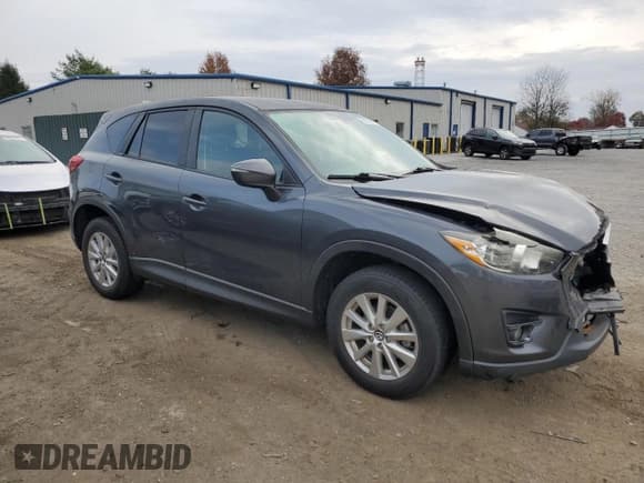 ✅ 2016 Mazda CX-5 Touring • VIN: JM3KE4CYXG0787043 • Lot: 90972585. Wystawiony na Copart z przebiegiem 99 074 mil. Bezpłatny archiwum sprzedaży aukcyjnych z USA i szczegółowy raport historii pojazdu na DreamBid. Zdjęcie 4.