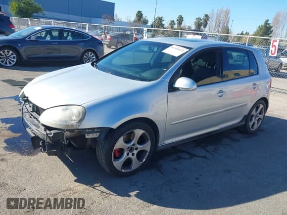 ✅ 2008 Volkswagen Golf GTI • VIN: WVWHV71K58W083740 • Лот: 41349692. Опубликован ранее на IAAI с пробегом 204 296 миль. Бесплатный доступ к архиву аукционных продаж из США и подробный отчёт об истории автомобиля на DreamBid. Изображение 18.