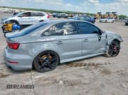 ✅ 2018 Audi RS 3 • VIN: WUABWGFFXJ1908112 • Лот: 61808795. Опубликован ранее на Copart с пробегом 100 290 миль. Бесплатный доступ к архиву аукционных продаж из США и подробный отчёт об истории автомобиля на DreamBid. Изображение 3.