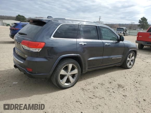 ✅ 2015 Jeep Grand Cherokee Overland • VIN: 1C4RJFCG1FC115844 • Lot: 47490555. Listed on Copart with 215,263 mi. Free auction sales archive from the USA and detailed vehicle history report at DreamBid. Image 3.