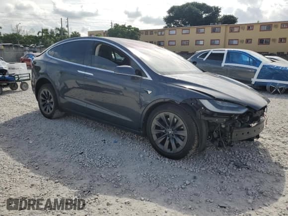 ✅ 2017 Tesla Model X 90D • VIN: 5YJXCBE24HF070223 • Lot: 89687385. Listed on Copart with 38,778 mi. Free auction sales archive from the USA and detailed vehicle history report at DreamBid. Image 4.