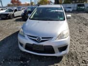✅ 2009 Mazda 5 Grand Touring • VIN: JM1CR29L190339259 • Лот: 89509345. Опубликован ранее на Copart с пробегом 159 250 миль. Бесплатный доступ к архиву аукционных продаж из США и подробный отчёт об истории автомобиля на DreamBid. Изображение 5.
