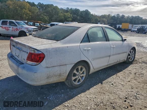 ✅ 2005 Toyota Camry XLE • VIN: JTDBF32KX50165830 • Лот: 94645765. Опубликован ранее на Copart с пробегом 184 231 миль. Бесплатный доступ к архиву аукционных продаж из США и подробный отчёт об истории автомобиля на DreamBid. Изображение 3.