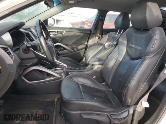 ✅ 2014 Hyundai Veloster • VIN: KMHTC6ADXEU214255 • Lot: 86828824. Wystawiony na Copart z przebiegiem 144 731 mil. Bezpłatny archiwum sprzedaży aukcyjnych z USA i szczegółowy raport historii pojazdu na DreamBid. Zdjęcie 7.