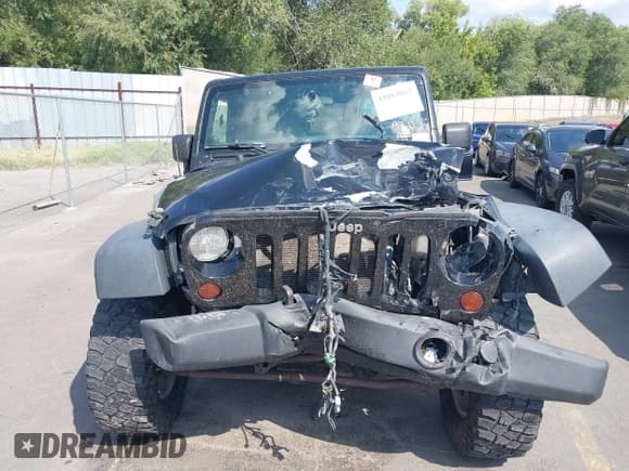 ✅ 2012 Jeep Wrangler Unlimited Sport • VIN: 1C4BJWDG2CL201563 • Lot: 43083863. Listed on IAAI with Not provided. Free auction sales archive from the USA and detailed vehicle history report at DreamBid. Image 12.