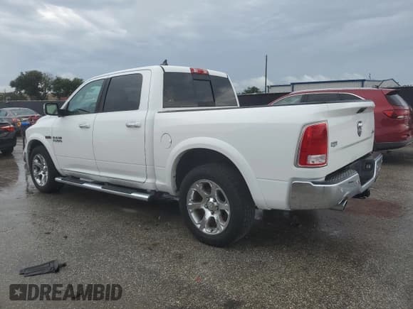 ✅ 2015 Ram 1500 Laramie • VIN: 1C6RR7NM7FS689086 • Lot: 70006105. Listed on Copart with 147,608 mi. Free auction sales archive from the USA and detailed vehicle history report at DreamBid. Image 3.