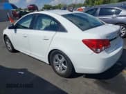 ✅ 2014 Chevrolet Cruze 1LT • VIN: 1G1PC5SB1E7135058 • Lot: 43266628. Listed on IAAI with 76,326 mi. Free auction sales archive from the USA and detailed vehicle history report at DreamBid. Image 3.