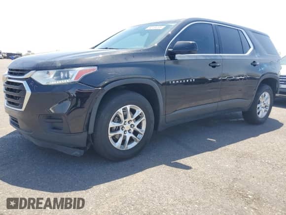 2018 Chevrolet Traverse LS with VIN 1GNEVFKW8JJ119221, listed as a Copart auction lot 64135205 with 128,751 mi miles and Salvage title. Bid and sale history available at DreamBid. Image 1.