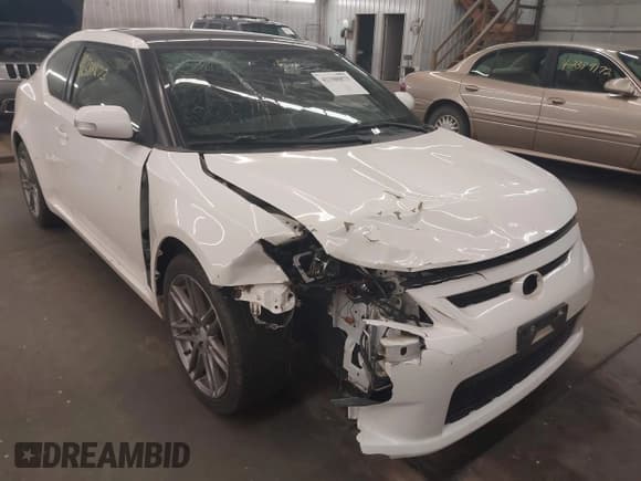 ✅ 2013 Scion tC • VIN: JTKJF5C7XD3063998 • Lot: 42388873. Wystawiony na IAAI z przebiegiem 198 828 mil. Bezpłatny archiwum sprzedaży aukcyjnych z USA i szczegółowy raport historii pojazdu na DreamBid. Zdjęcie 6.
