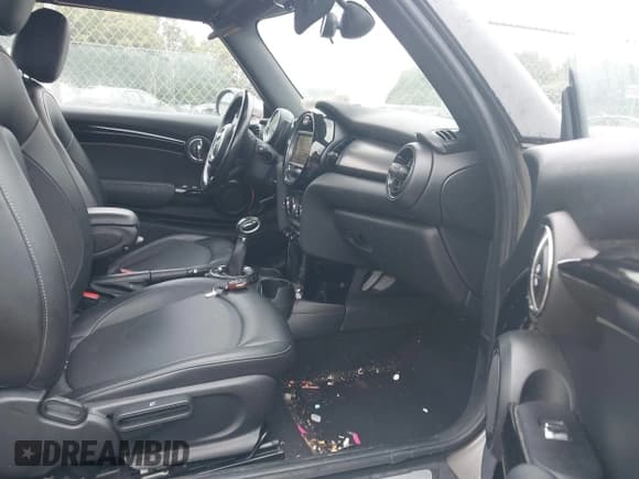 ✅ 2016 MINI Convertible • VIN: WMWWG5C52G3A83417 • Lot: 42942678. Listed on IAAI with 83,428 mi. Free auction sales archive from the USA and detailed vehicle history report at DreamBid. Image 5.