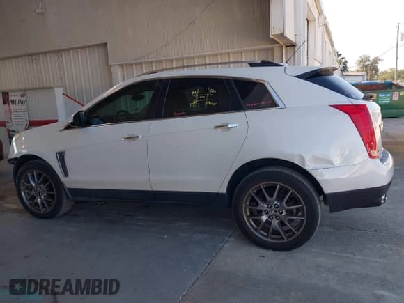✅ 2016 Cadillac SRX Performance Collection • VIN: 3GYFNCE30GS565930 • Lot: 43711639. Listed on IAAI with 112,092 mi. Free auction sales archive from the USA and detailed vehicle history report at DreamBid. Image 15.