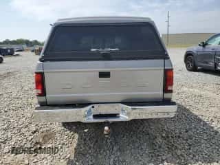 1993 Dodge Dakota z VIN 1B7GG23YXPS240792, wystawiony jako Copart lot #54324035 z przebiegiem 137 028 mil mil oraz Szkoda całkowita • Salvage title. Historia ofert i sprzedaży dostępna na DreamBid. Obrazek 6.