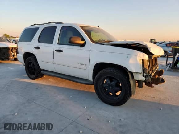 2007 Chevrolet Tahoe LS with VIN 1GNFC13C17R354832, listed as a Copart auction lot 82367185 with 234,396 mi miles and Salvage title. Bid and sale history available at DreamBid. Image 4.