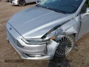 ✅ 2017 Ford Fusion Titanium • VIN: 3FA6P0K91HR185551 • Лот: 43092372. Опубликован ранее на IAAI с пробегом 75 426 миль. Бесплатный доступ к архиву аукционных продаж из США и подробный отчёт об истории автомобиля на DreamBid. Изображение 6.