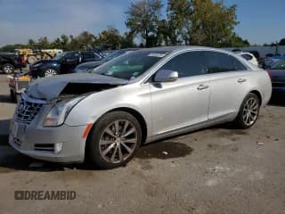 ✅ 2013 Cadillac XTS Luxury • VIN: 2G61P5S31D9231525 • Лот: 81006725. Опубликован ранее на Copart с пробегом 139 509 миль. Бесплатный доступ к архиву аукционных продаж из США и подробный отчёт об истории автомобиля на DreamBid. Изображение 1.