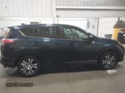 ✅ 2018 Toyota RAV4 LE • VIN: 2T3BFREV6JW767297 • Lot: 43736278. Listed on IAAI with 99,323 mi. Free auction sales archive from the USA and detailed vehicle history report at DreamBid. Image 14.