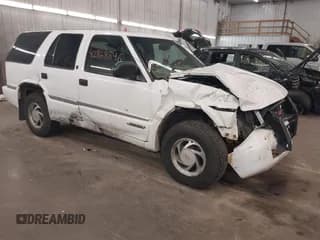 ✅ 1999 GMC Jimmy SLT • VIN: 1GKDT13W4X2541943 • Лот: 42868846. Опубликован ранее на IAAI с пробегом 142 124 миль. Бесплатный доступ к архиву аукционных продаж из США и подробный отчёт об истории автомобиля на DreamBid. Изображение 1.