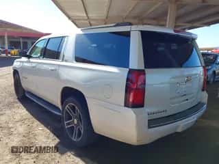 2015 Chevrolet Suburban LTZ z VIN 1GNSKKKCXFR729558, wystawiony jako IAAI lot #43487566 z przebiegiem 109 722 mil mil oraz . Historia ofert i sprzedaży dostępna na DreamBid. Obrazek 3.