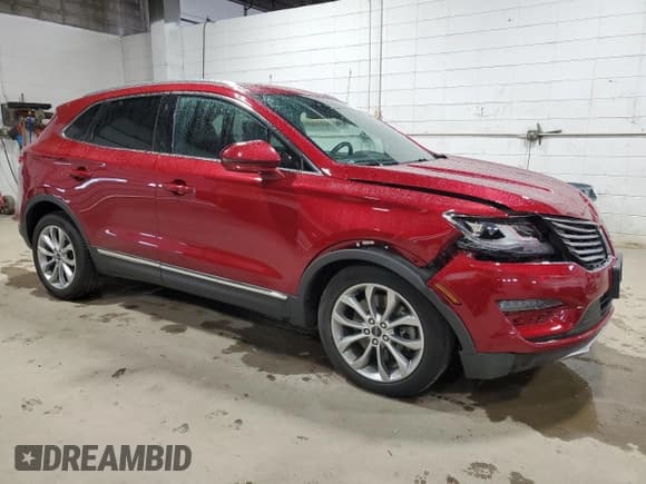 ✅ 2017 Lincoln MKC Select • VIN: 5LMCJ2D96HUL45867 • Lot: 57597325. Listed on Copart with 73,147 mi. Free auction sales archive from the USA and detailed vehicle history report at DreamBid. Image 4.
