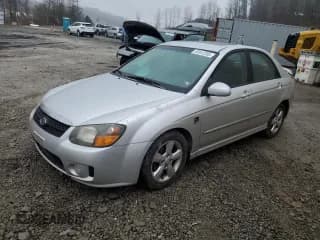 ✅ 2009 Kia Spectra EX • VIN: KNAFE222795027263 • Lot: 93812205. Listed on Copart with 164,002 mi. Free auction sales archive from the USA and detailed vehicle history report at DreamBid. Image 1.