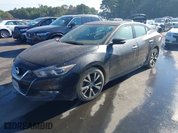 ✅ 2016 Nissan Maxima Platinum • VIN: 1N4AA6APXGC420718 • Lot: 43141870. Wystawiony na IAAI z przebiegiem 182 289 mil. Bezpłatny archiwum sprzedaży aukcyjnych z USA i szczegółowy raport historii pojazdu na DreamBid. Zdjęcie 17.