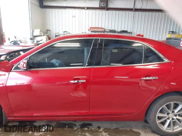 2013 Chevrolet Malibu LTZ with VIN 1G11J5SX9DF236571, listed as a IAAI auction lot 42312073 with 114,404 mi miles and . Bid and sale history available at DreamBid. Image 14.