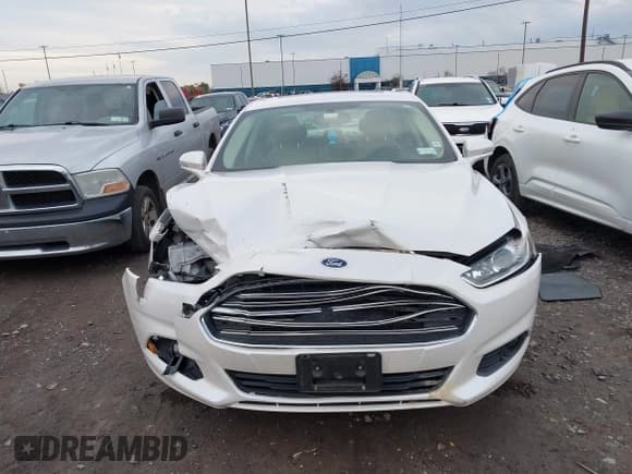 ✅ 2014 Ford Fusion SE Hybrid • VIN: 3FA6P0LU8ER175954 • Лот: 43615028. Опубликован ранее на IAAI с пробегом 108 932 миль. Бесплатный доступ к архиву аукционных продаж из США и подробный отчёт об истории автомобиля на DreamBid. Изображение 12.