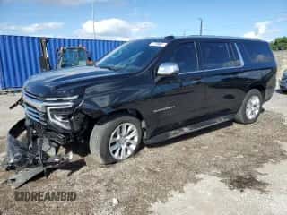 2025 Chevrolet Suburban Premier z VIN 1GNS6FRD2SR246005, wystawiony jako Copart lot #86817715 z przebiegiem 13 239 mil mil oraz Czysty tytuł • Clean title. Historia ofert i sprzedaży dostępna na DreamBid. Obrazek 1.