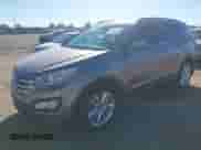 2015 Hyundai Santa Fe z VIN 5XYZWDLA9FG240216, wystawiony jako IAAI lot #43616955 z przebiegiem 203 691 mil mil oraz . Historia ofert i sprzedaży dostępna na DreamBid. Obrazek 2.