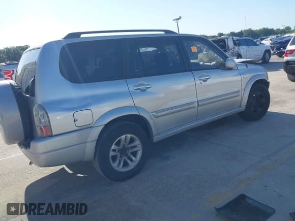 ✅ 2004 Suzuki XL7 LX • VIN: JS3TY92V744109459 • Lot: 42030103. Listed on IAAI with 170,132 mi. Free auction sales archive from the USA and detailed vehicle history report at DreamBid. Image 4.