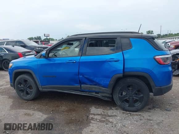 2021 Jeep Compass Latitude with VIN 3C4NJDBB2MT595256, listed as a IAAI auction lot 43058271 with 102,541 mi miles and . Bid and sale history available at DreamBid. Image 14.