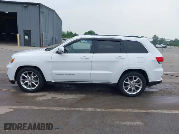 ✅ 2015 Jeep Grand Cherokee Summit • VIN: 1C4RJFJG1FC135935 • Lot: 42494004. Listed on IAAI with 201,553 mi. Free auction sales archive from the USA and detailed vehicle history report at DreamBid. Image 14.