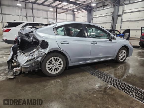 ✅ 2017 Subaru Impreza Premium • VIN: 4S3GKAB61H3609561 • Lot: 80363265. Listed on Copart with 60,645 mi. Free auction sales archive from the USA and detailed vehicle history report at DreamBid. Image 3.