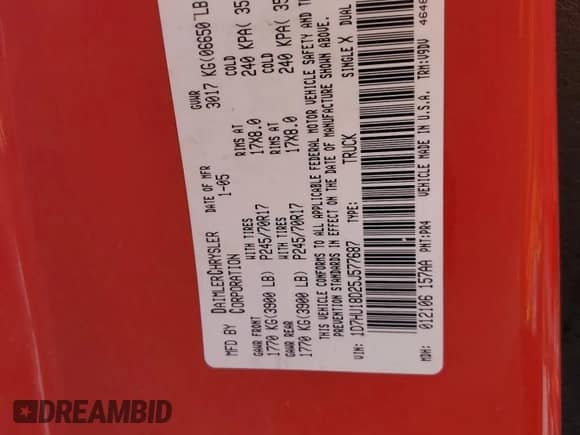 2005 Dodge 1500 SLT z VIN 1D7HU18D25J577687, wystawiony jako Copart lot #70517064 z przebiegiem 248 742 mil mil oraz Szkoda całkowita • Salvage title. Historia ofert i sprzedaży dostępna na DreamBid. Obrazek 14.