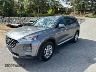 2019 Hyundai Santa Fe SE with VIN 5NMS23ADXKH019907, listed as a Copart auction lot 84832325 with 194,456 mi miles and Clean title. Bid and sale history available at DreamBid. Image 1.