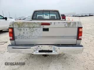 1995 Dodge Dakota z VIN 1B7GL23X4SS310105, wystawiony jako Copart lot #57172375 z przebiegiem 164 316 mil mil oraz Szkoda całkowita • Salvage title. Historia ofert i sprzedaży dostępna na DreamBid. Obrazek 6.