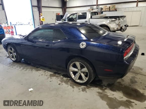 ✅ 2014 Dodge Challenger SXT • VIN: 2C3CDYAG7EH250144 • Lot: 80188684. Wystawiony na Copart z przebiegiem 209 114 mil. Bezpłatny archiwum sprzedaży aukcyjnych z USA i szczegółowy raport historii pojazdu na DreamBid. Zdjęcie 2.