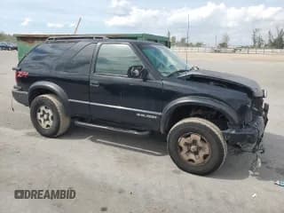 ✅ 1999 Chevrolet Blazer LS • VIN: 1GNCT18W6XK224253 • Lot: 50708405. Wystawiony na Copart z przebiegiem 209 711 mil. Bezpłatny archiwum sprzedaży aukcyjnych z USA i szczegółowy raport historii pojazdu na DreamBid. Zdjęcie 4.